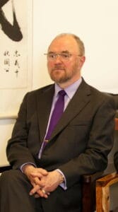 The Director of the ICTCM, Thomas Shanahan is shown in the main college lecture room in Dublin.