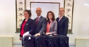 A group of graduates ready to change career, each with their Acupuncture TCM equiptment bag