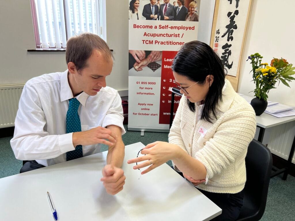 New TCM Acupuncture students learning Acupuncture Point Location at the ICTCM in Dublin